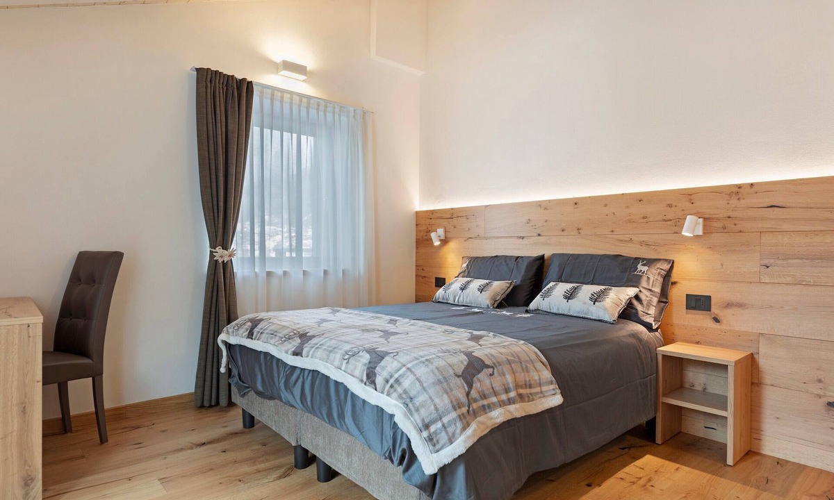 San Lorenzo in Banale Apartment | Apartment 'Alpen Blumen Stella Alpina' with Mountain View, Terrace and Wi-Fi