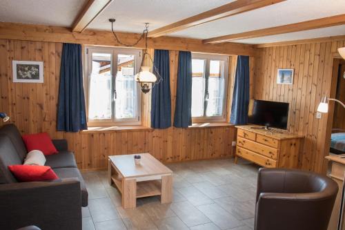 Morissen Apartment | Casa Curgnun 21 Collenberg - Ferienwohnung 61m2 für max. 4 Pers.