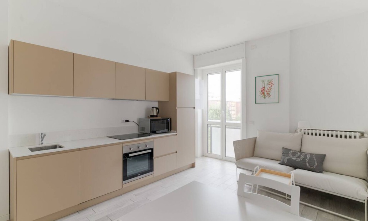 Cascina dei Pomi Apartment | GuestHost - Elegant 45 sqm studio apartment, ideal for two, located on the fifth floor of a building with elevator (NOT suitable for people with disabilities). The property is in the Maggiolina district, known for its elegant villas, parks, and tree-line