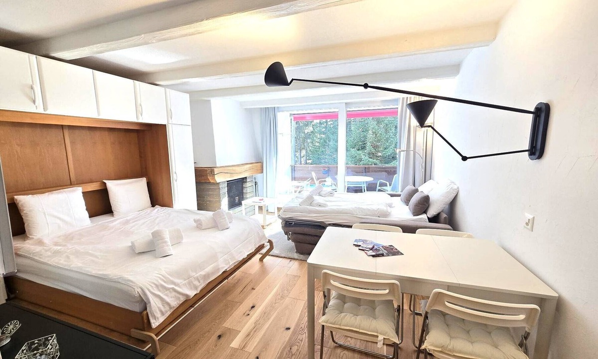 Lenzerheide Apartment | La Riva Mountain Apartment, right on the lake and next to the Fadail valley station, Lenzerheide