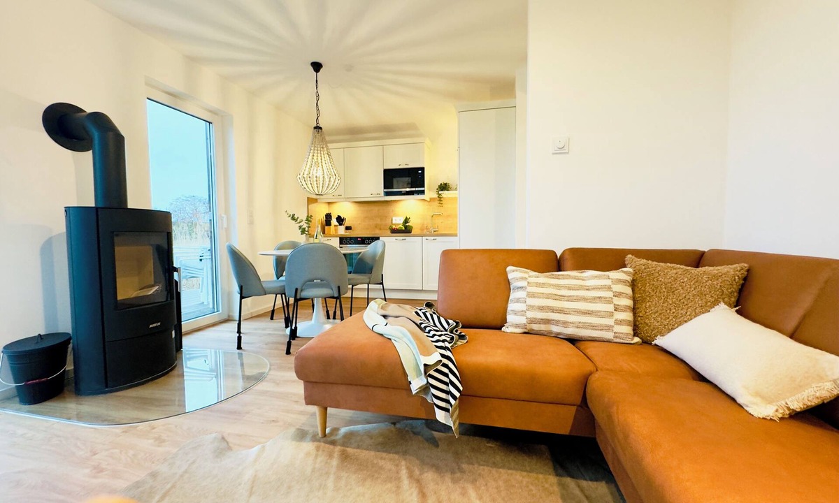 Tossens House | Ostwind - peace and quiet on the dyke. Fireplace. Sauna. Family time.