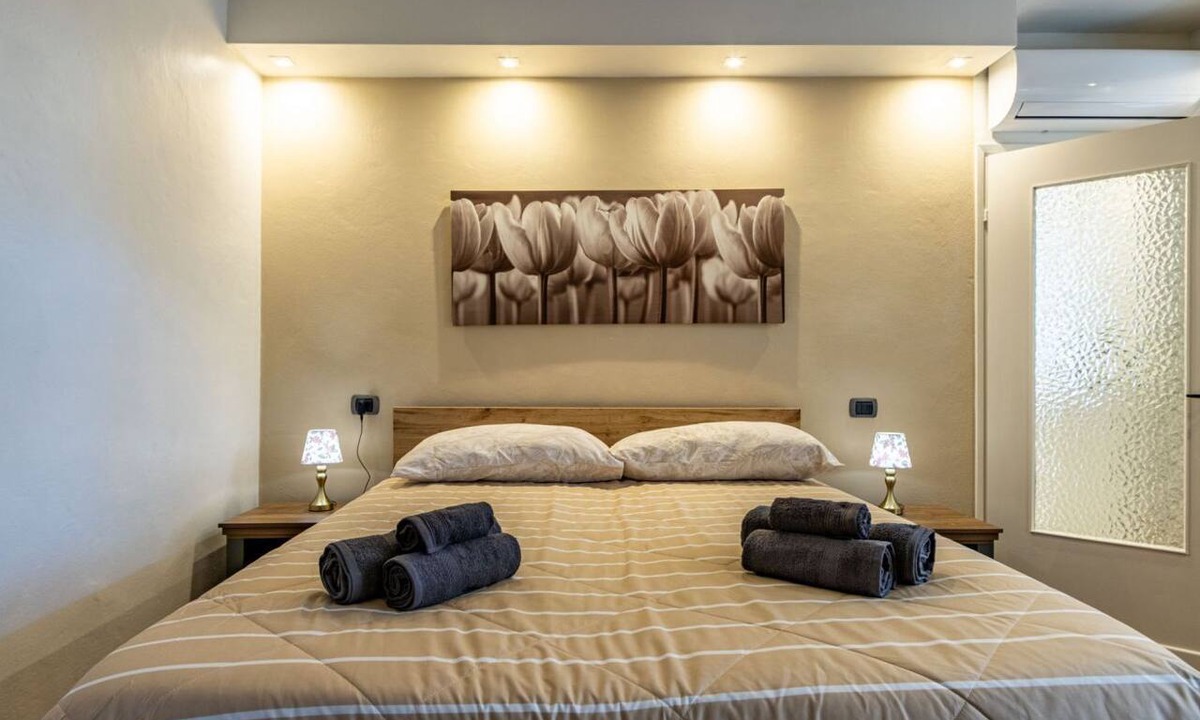 Dagnente Apartment | Piazzetta 5, Dagnente - Arona - AC - Wi-Fi - By Guestaly