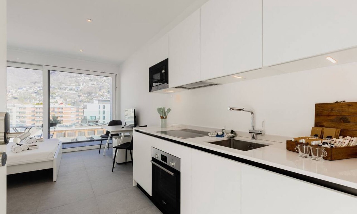 Lugano Apartment | {Suite 508} Gym, Business Room, Modern, Relax