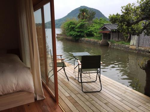 Kumihamacho Hotel | Waterside Cottage Heron