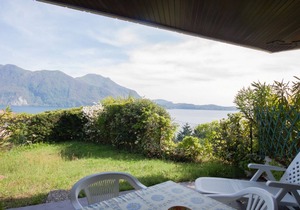 Attractive studio with terrace and garden, pool and dream view in Ghiffa
