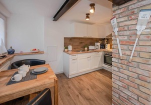 Cozy vacation apartment in Heringsdorf with large garden & whirlpool - only 550 m in Seebad Heringsdorf