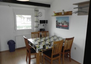 Detached holiday home in 2nd row on the lake in Eckwarderhörne