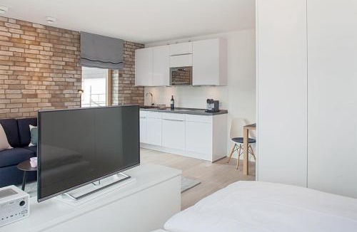 Sankt Alban Apartment | 2,5 Zi Design Loft Wohnung mit Gartensitzplatz