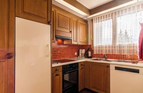 Flims Apartment | 4.5 room family apartment in Flims with sunny terrace and garden access.