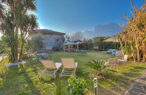 Torbole sul Garda Apartment | Agritur Laura- Essenza di rosa 2 with Shared Garden, Torbole sul Garda, Italy