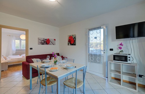 Torbole sul Garda Apartment | Agritur Laura - L'angolo dei Fiori 4 with Shared Garden, Torbole sul Garda, Italy