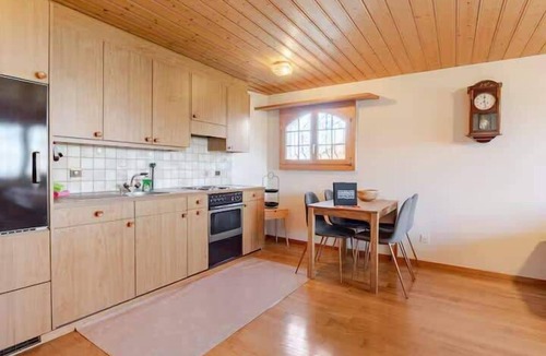 Reichenbach im Kandertal Apartment | Alpine Garden Retreat | Panoramic Mountain Views