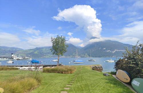Faulensee Apartment | Am See l 15 Minuten nach Interlaken l gratis Parking
