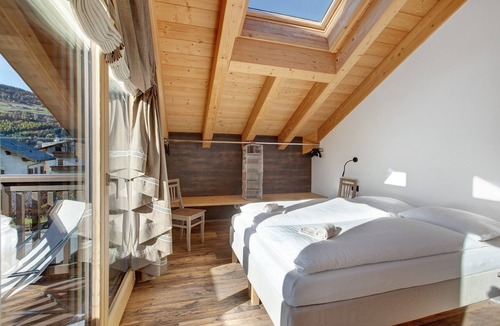 Valtellina Apartment | Apartment "Baita Emilia e Daniele 12 13" near the slopes with 2 balconies and Wi-Fi