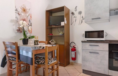 Laveno Apartment | Apartment 'Casa Arianna' with Mountain View, Private Garden and Wi-Fi