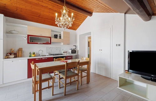Arona Apartment | Apartment 'Comodo, Pratico E Tranquillo' with Mountain View, Wi-Fi and Air Conditioning