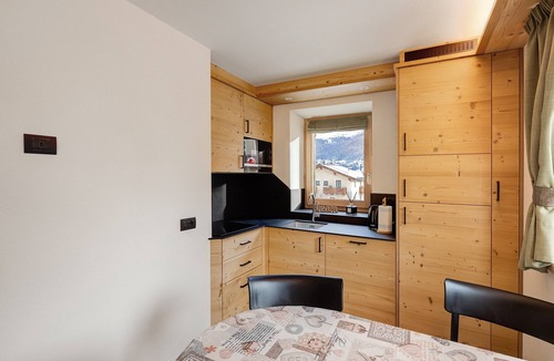 San Rocco Apartment | Apartment "Corolla Rosina's Home" with Mountain View, Balcony & Wi-Fi