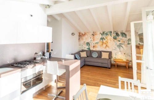 Olcio Apartment | Apartment located on the fourth floor (served by elevator from the garage) of a building facing the lake.The apartment enjoys a 180 degree view of the wonderful Lake Como.The position allows you to enjoy a unique view and feel like you are on the water's