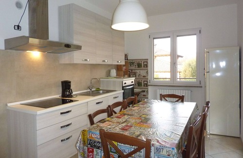 Porto Valtravaglia Apartment | Apartment 'Sunset On Lake Maggiore 2 Garages' with Garden, Balcony and Wi-Fi