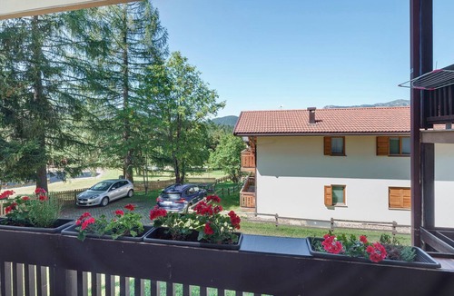 Bellamonte Apartment | 'Bilocale Nuovo Alpe Lusia - Fiemme' Apartment with Mountain View, Garden & Wi-Fi