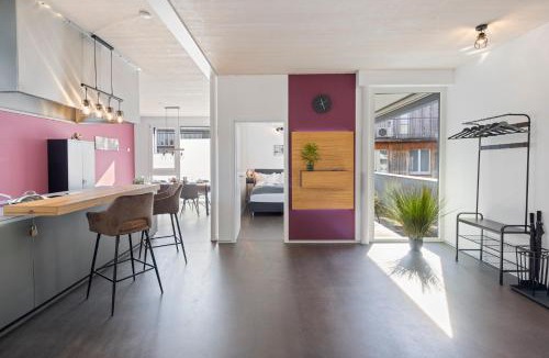 Langenthal Apartment | Casa Milla-Zentrales, modernes Loft in Langenthal -am Fluss mit Balkon, Parkplatz und grosser Küche