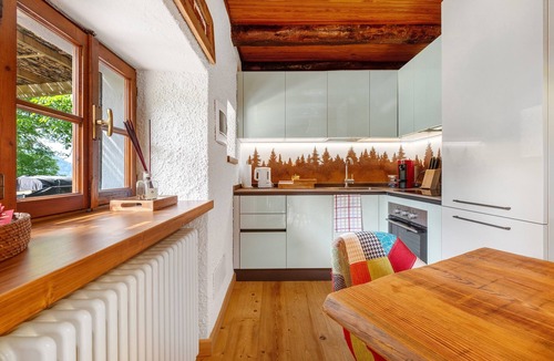 Occagno Ski Chalet | Chalet 'Nini's Home' with Terrace and Garden with BBQ