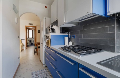 Garegnano Apartment | Comfortable 50m2 flat for 4 people, on the 1st floor with lift.Located in the Certosa area, a neighborhood well connected to the centre, the motorways & the exhibition centres. Nearby is the historic Certosa di Garegnano, famous for its frescoes.On foot