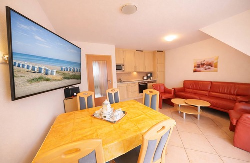 Horumersiel Apartment | Comfortable accommodation Roter Sand - right on the beach with WLAN & balcony