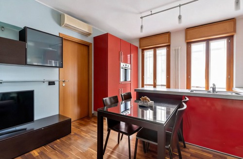 Crescenzago Apartment | Elegant Three-Bedroom Apartment with a Terrace Overlooking the Park, a Jacuzzi, and a Garage