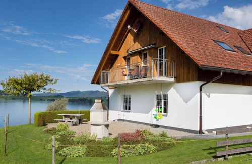 Gross Apartment | Ferienhof am See – Willerzell, (Willerzell), by Interhome