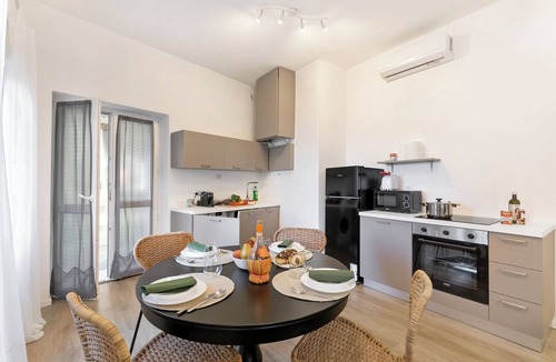 Levo Apartment | Gaia on Stresa Hill: 2BR with AC and Outdoor Space, Stresa, Italy