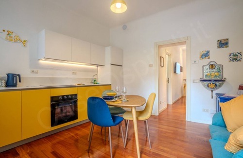 Cernusco sul Naviglio Apartment | GuestHost - Experience the authentic atmosphere of Sicily in this renovated two-room apartment with Mediterranean charm in the heart of a quiet courtyard on the ground floor. The welcoming double bedroom and the bright living room blend with handcrafted