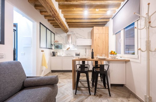 Oltretorrente Apartment | GuestHost - A refined and modern 55 sq m apartment, accommodating up to 4 people, located on the second floor of a 4-story building with an elevator.The property is located in Parma's Oltretorrente neighborhood, a quiet residential area with plenty of am