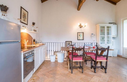 Villa Guardia Apartment | GuestHost - Confortable and stylish 90smq duplex apt that can accomodate up to 4 people located in a period building without a lift.Portion of private garden, large garden with shared pool and private parking space.Inside the building there is a historic