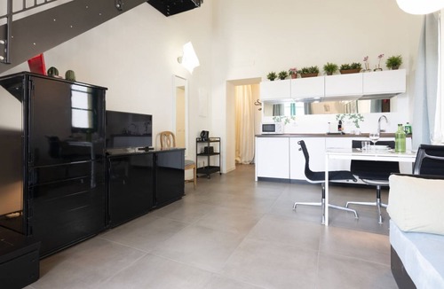 Gorgonzola Apartment | GuestHost - Just a few minutes on foot from the center of Gorgonzola, Casa Nina is a two-level apartment, converted from an ancient courtyard typical of Lombard villages from the early 1900s. It features a quaint bedroom for two on the mezzanine and a co