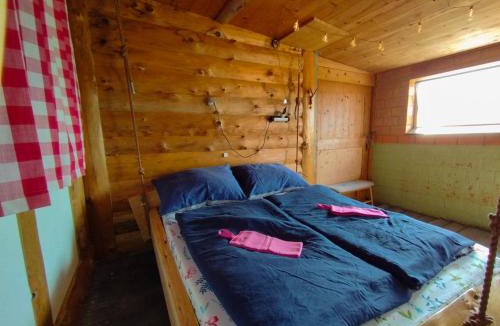 Fahrni House | Hängebett im Stall