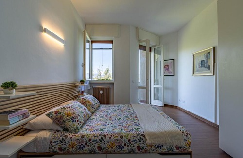 Dormelletto Apartment | Lake View - Apartment with terrace - AC - WiFi - By Guestaly