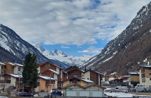 Taesch Apartment | Large apartment with panoramic view and free parking, 5 min from train station