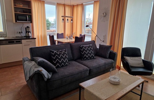Grossenbrode Apartment | Modern vacation apartment Seestern 31 in Großenbrode. Exclusive vacation oasis with sauna & bathtub. Sunny terrace for relaxed vacation moments. Storage room for bicycles & seasonal beach chair included