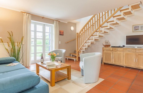 Kreptitz Apartment | quiet apartment near the beach on the ground floor + DG with garden incl. Indoor swimming pool /sauna etc.