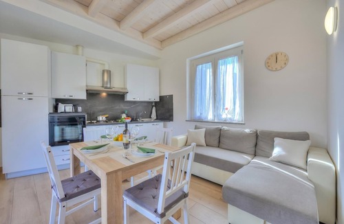 Arolo Apartment | Sunflower Terrace: Duplex for 4, Walk to Lake + Parking, Leggiuno, Italy