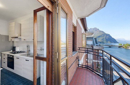 Malgrate Apartment | The Terrace on the Adda – Apartment with Stunning Lake and Mountain Views