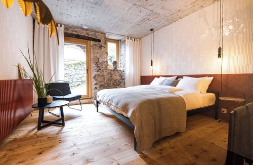 Mitloedi Apartment | Tremondi Boutique BNB & Restaurant, (Quinten), by Interhome