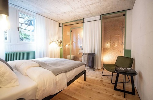 Mitloedi Apartment | Tremondi Boutique BNB & Restaurant, (Quinten), by Interhome