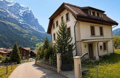 Grindelwald House | Villa Flora 1909 – with Wellness Area and Prime Location in Grindelwald