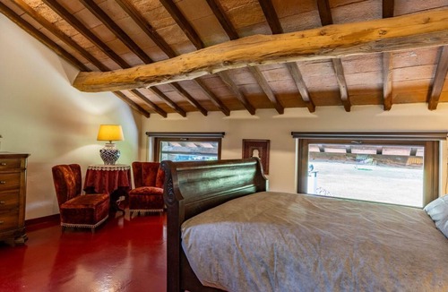 Dormelletto Apartment | Villa Harmonia - Luxury Rooms - Camelia Suite - AC - By Guestaly