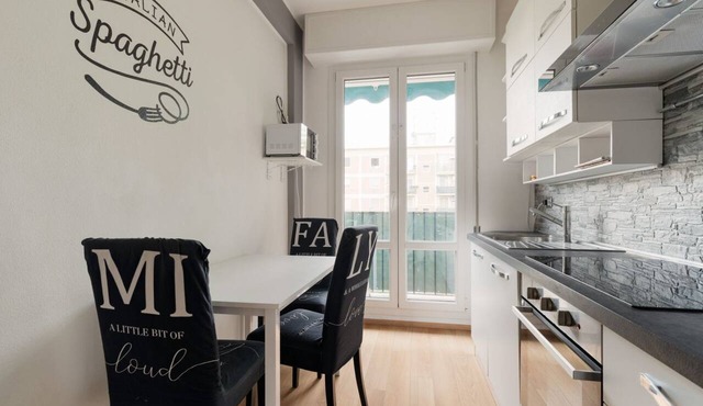 A cozy 70 sqm apartment, ideal for 4 people, located on the 4th floor of a building with an elevator.The property is situated in the Quartiere degli Olmi, a residential area in western Milan.Surrounded by expansive green spaces, the neighborhood offers a in Milan