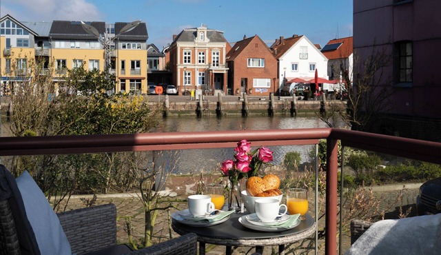 Comfortable holiday apartment with a balcony and modern amenities in Husum in Husum