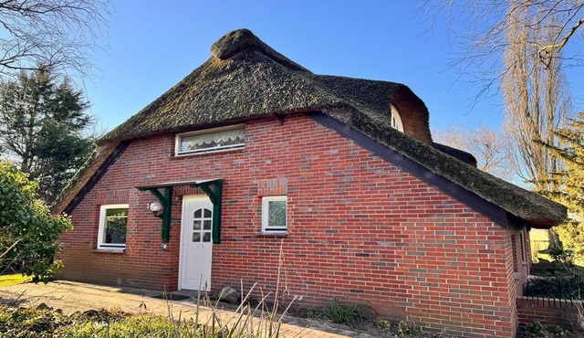 Ferienwohnung im Reetdachhaus, Burhave in Burhave