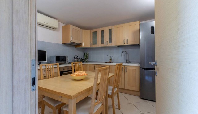 GuestHost - A comfortable and welcoming 75 square meters apartment with a large courtyard and private entrance, perfect for six people, located on the ground floor of a renovated historic building facing the canal (NOT accessible by car).The property enj in Comacchio